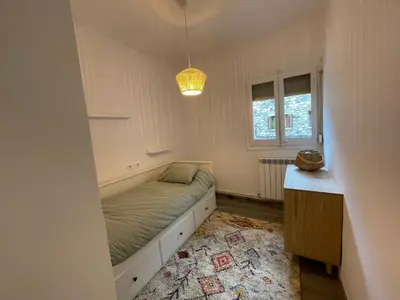 Cama o camas de una habitación en CHECK-IN CASAS Casa Aurora