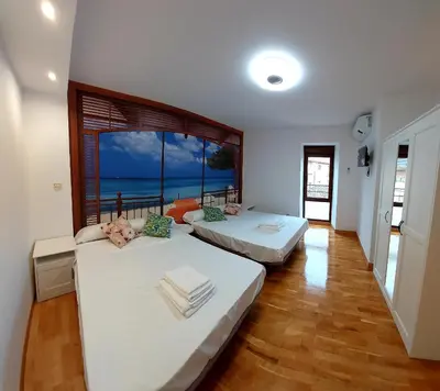 Cama o camas de una habitación en B&B Apartamentos La Atalaya