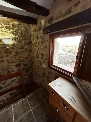 Cama o camas de una habitación en Rural Stone House with wood fireplace