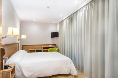 Cama o camas de una habitación en HOTEL JAUME D'URGELL