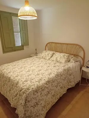 Cama o camas de una habitación en Cal Pigat