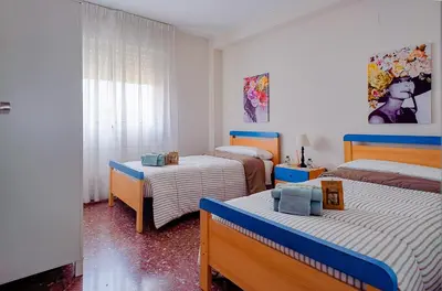 Cama o camas de una habitación en Apartamento turístico Parque Borja