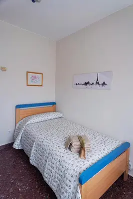 Cama o camas de una habitación en Apartamento turístico Parque Borja