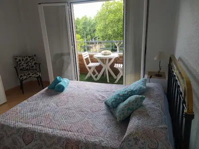 Cama o camas de una habitación en El Refugio