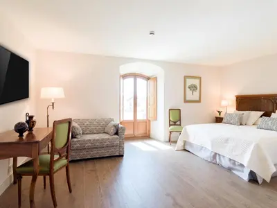 Cama o camas de una habitación en Hospedium Hotel Palacio La Lozana