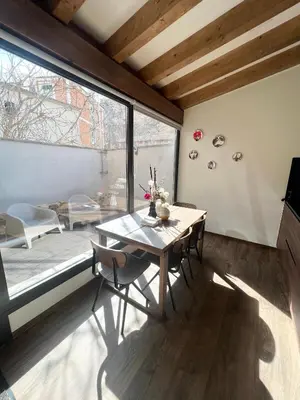 Una televisión o centro de entretenimiento en BÁNOVA APARTAMENTO TURÍSTICO