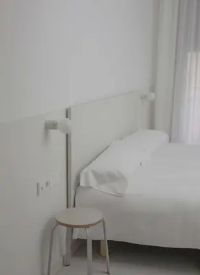 Cama o camas de una habitación en HOTEL LA FONDA B&B