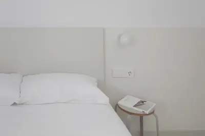 Cama o camas de una habitación en HOTEL LA FONDA B&B