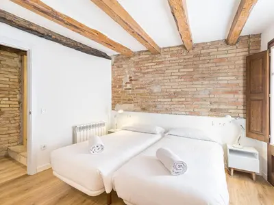 Cama o camas de una habitación en Cal Rellotger de Solsona