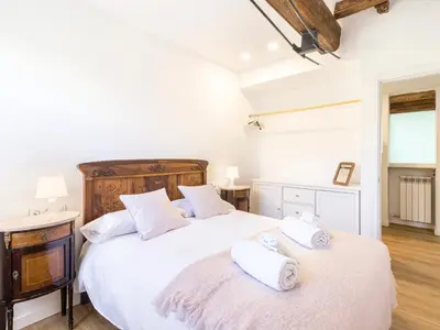 Cama o camas de una habitación en Cal Rellotger de Solsona