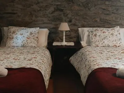 Cama o camas de una habitación en CASA JAN, Casa Rural en Beraní