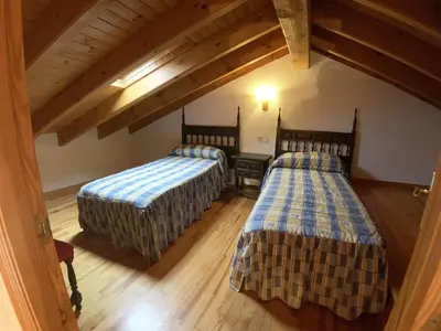 Cama o camas de una habitación en C11 - Apartamento Casa Llorgodo 2 - Villmor
