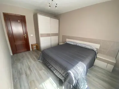 Cama o camas de una habitación en APARTAMENTO TURIETO (BROTO-ORDESA)