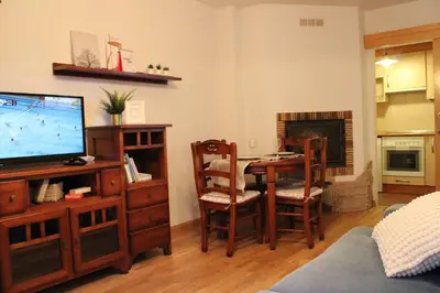 Una televisión o centro de entretenimiento en Apartamento Sauce