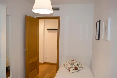 Cama o camas de una habitación en Apartamenticos Torrenueva I