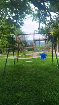 Zona de juegos infantil en Casa Rural Tejedor