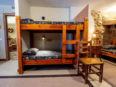 Cama o camas de una habitación en Albergue de peregrinos en CIRAUQUI - CASA MARALOTX Camino de Santiago