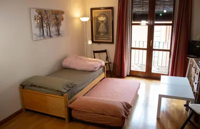 Cama o camas de una habitación en Bonita vivienda en el corazón de Zaragoza