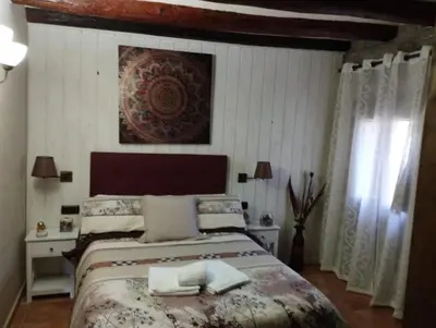 Cama o camas de una habitación en Cimas con historia