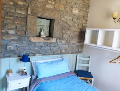 Cama o camas de una habitación en Cimas con historia