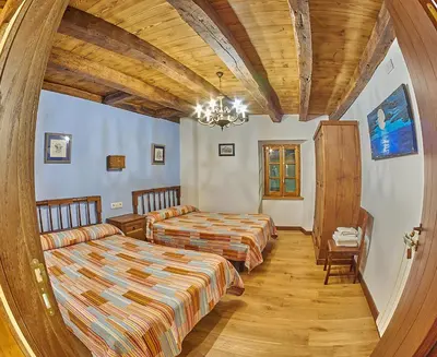 Cama o camas de una habitación en Casa Rural Lenco