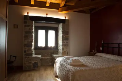 Cama o camas de una habitación en El torreon de la Bruna