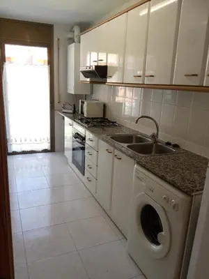 Una cocina o zona de cocina en APARTAMENTS CASA NANDO.