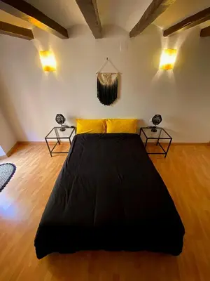 Cama o camas de una habitación en Cornu Karma Apartment El Pati