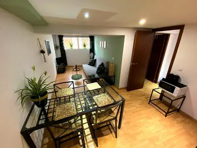 Zona de estar de Cornu Karma Apartment El Pati