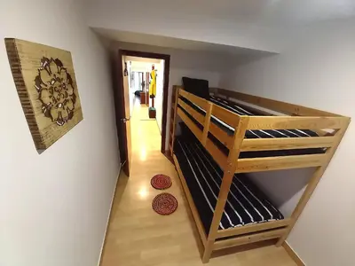 Cama o camas de una habitación en Cornukarma Apartamiento La Capella