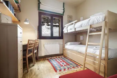 Cama o camas de una habitación en Luderna - Apartamento Tanau A2 Esquirós 2