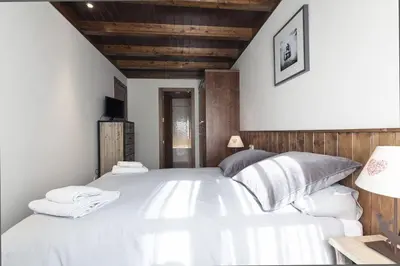 Cama o camas de una habitación en Luderna - Apartamento Val de Ruda A10 Gerber