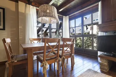 Una televisión o centro de entretenimiento en Luderna - Apartamento Val de Ruda A10 Gerber