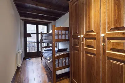 Cama o camas de una habitación en Luderna - Apartamento Val de Ruda A10 Gerber
