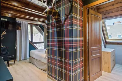 Cama o camas de una habitación en Luderna - Tríplex Val de Ruda E3 der Humarau