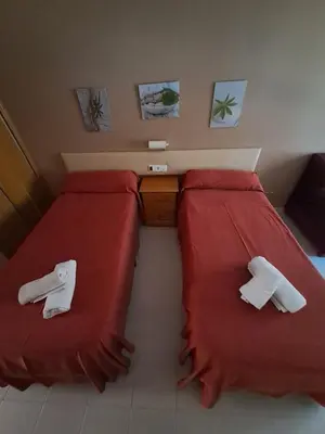 Cama o camas de una habitación en EL MESON