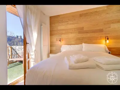 Cama o camas de una habitación en ETH PAUM de Alma de Nieve