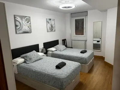 Cama o camas de una habitación en Leire Jaca Centro