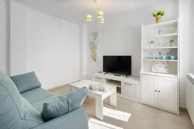 Una televisión o centro de entretenimiento en Apartamento Rural Paloma