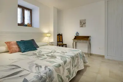 Cama o camas de una habitación en Apartamento Rural Paloma