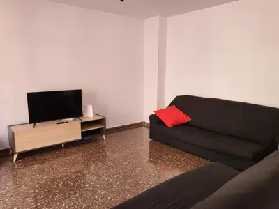 Una televisión o centro de entretenimiento en Apartamento San Andres