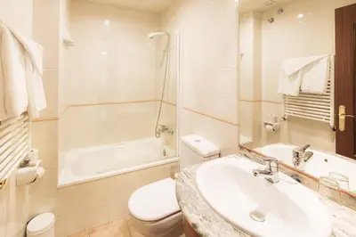 Un baño de Aparthotel Trainera