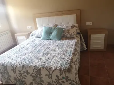 Cama o camas de una habitación en Mas del Olivar