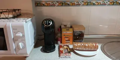 Una cocina o zona de cocina en El Ático Nuevo en el centro con ascensor, garaje, aire acondicionado y WiFi