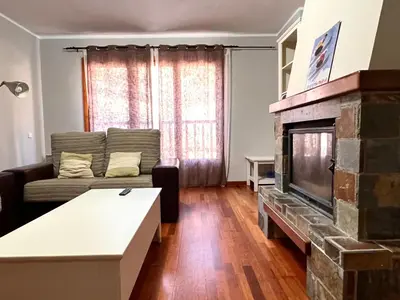 Una televisión o centro de entretenimiento en Apartamento Raval - L'Amfitriona
