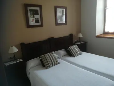 Cama o camas de una habitación en TXARRENEA
