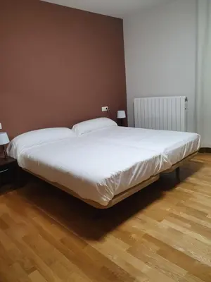 Cama o camas de una habitación en Hostal Rural 18 de Abril