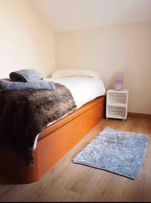 Cama o camas de una habitación en Ático Guara&Pirineos