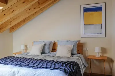 Cama o camas de una habitación en El Descanso del Sol - Apartamento en Pirineos