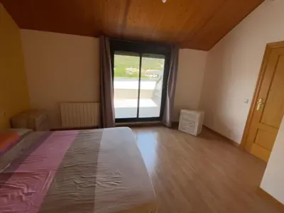 Cama o camas de una habitación en Duplex tres habitaciones Pirineo